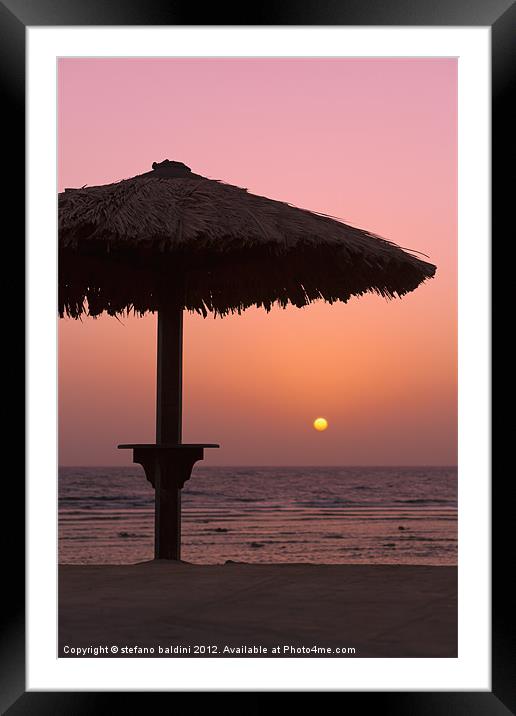 Sunrise with beach parasol, Dahab, Egypt Framed Mounted Print by stefano baldini