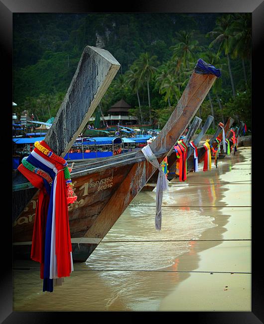 Thailand boats at waters edge. Framed Print by David Worthington