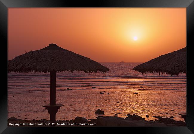 Sunrise with beach parasols, Dahab, Egypt Framed Print by stefano baldini