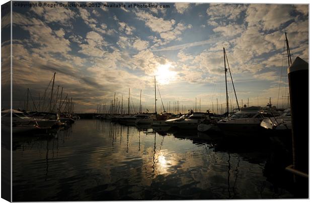 Jersey Marina with Low Sun Canvas Print by Roger Cruickshank