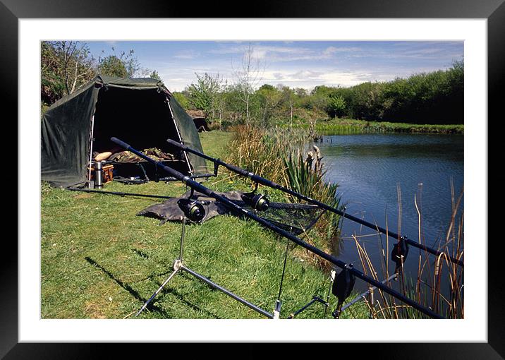A fisherman in a bivvy Framed Mounted Print by Simon Armstrong