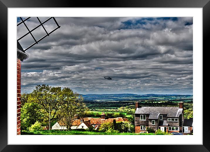 hellicopter over brill Framed Mounted Print by carl blake