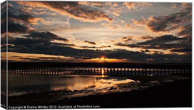 Sunset over Amble Canvas Print by Elaine Whitby