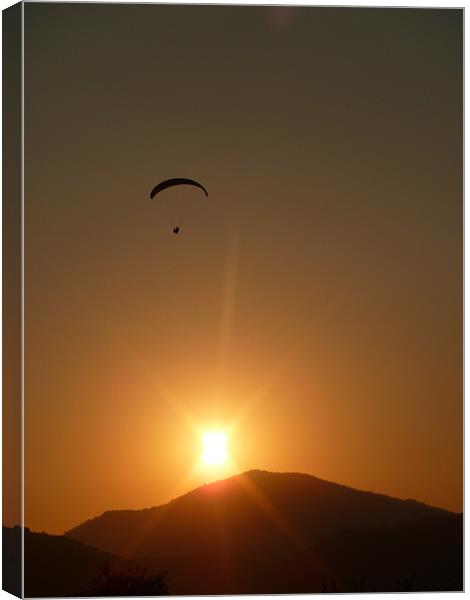Paragliding Sunset Canvas Print by Richard Ashton
