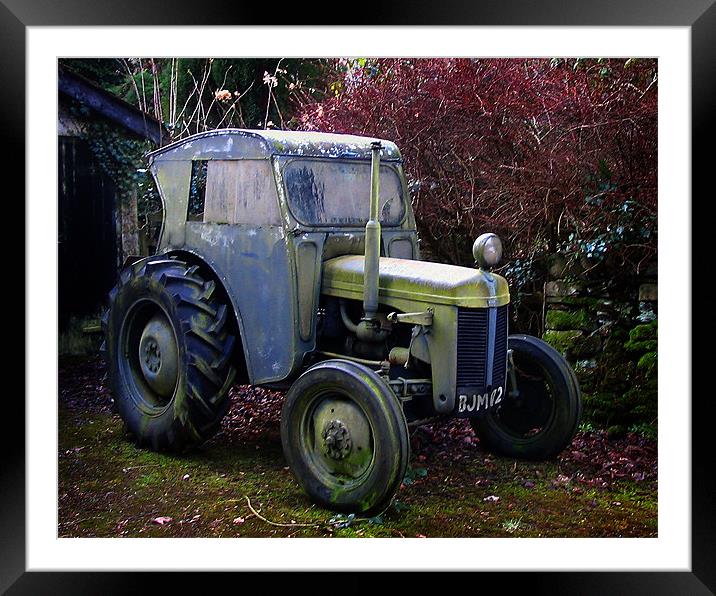 Disused tractor Framed Mounted Print by David Worthington