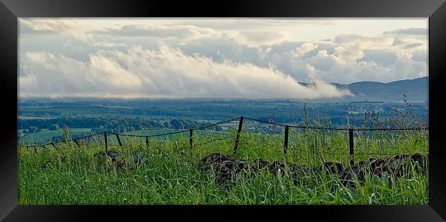 Low clouds in the evening Framed Print by Kevin Dobie
