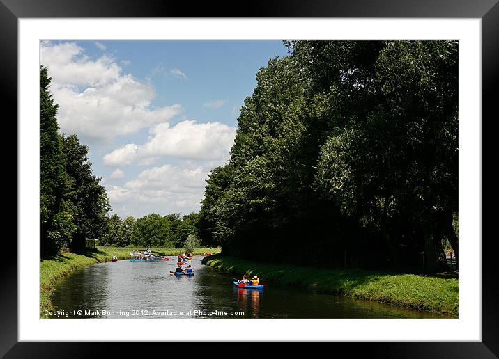 Fun on the river in a canoe Framed Mounted Print by Mark Bunning