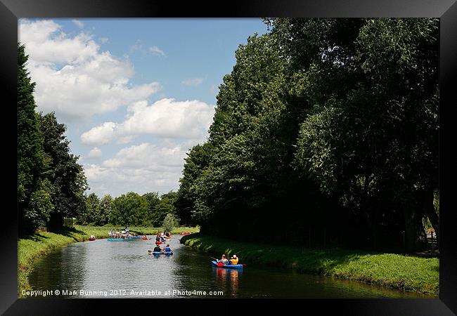 Fun on the river in a canoe Framed Print by Mark Bunning
