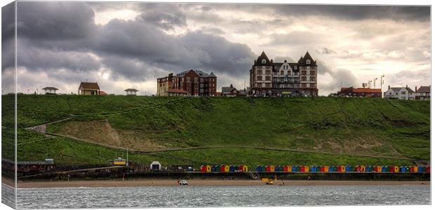 Whitby Beach Huts Canvas Print by Tom Gomez