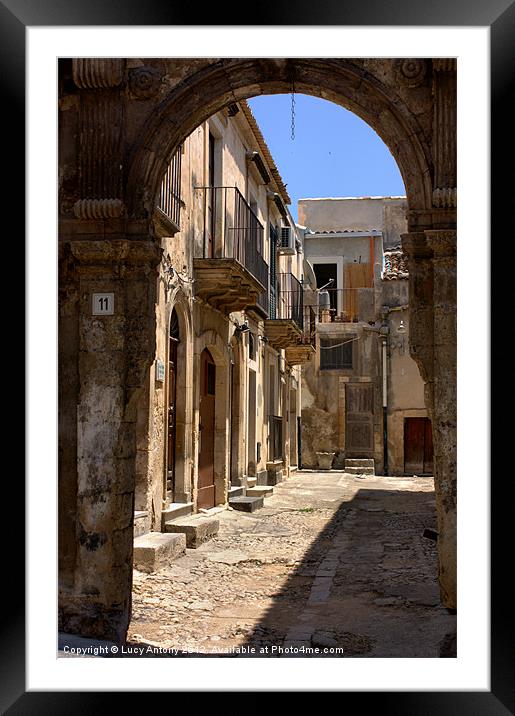 through the arch, Noto Framed Mounted Print by Lucy Antony