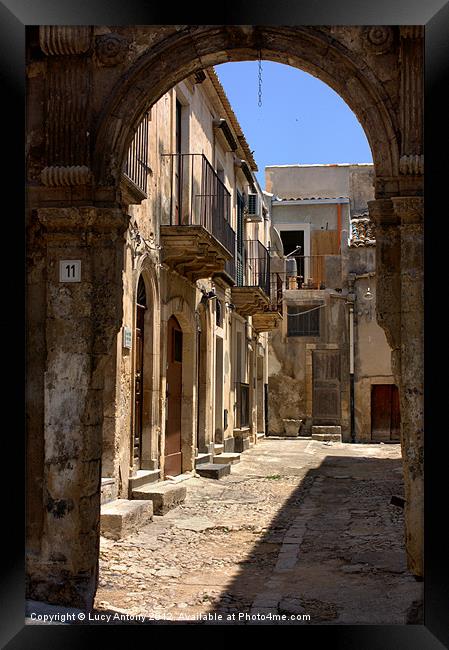 through the arch, Noto Framed Print by Lucy Antony