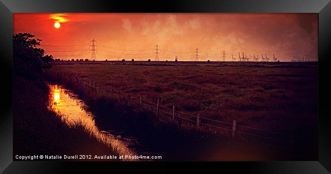 Sunset Pylons Framed Print by Natalie Durell
