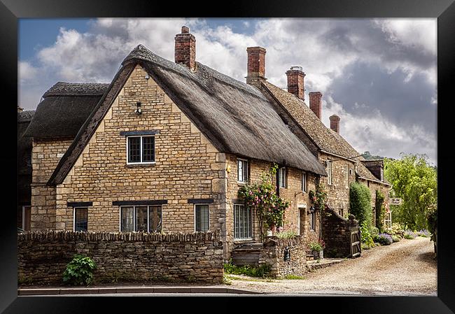 Thatched houses at Long Compton Framed Print by Stephen Mole