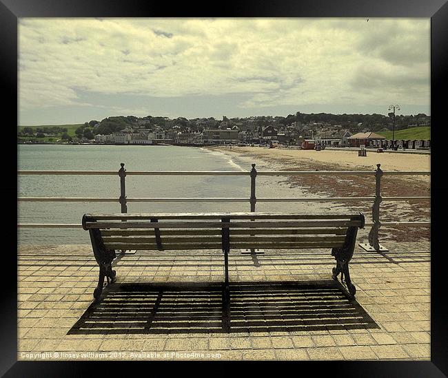 Bench on the jetty Framed Print by Linsey Williams