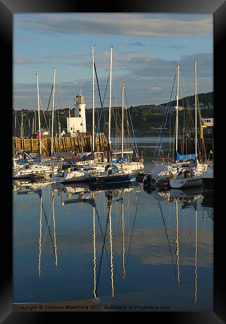 Harbour in evening light Framed Print by Stephen Wakefield
