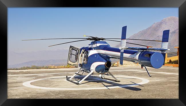 Helicopter ready for takeoff from helipad Framed Print by Arfabita  