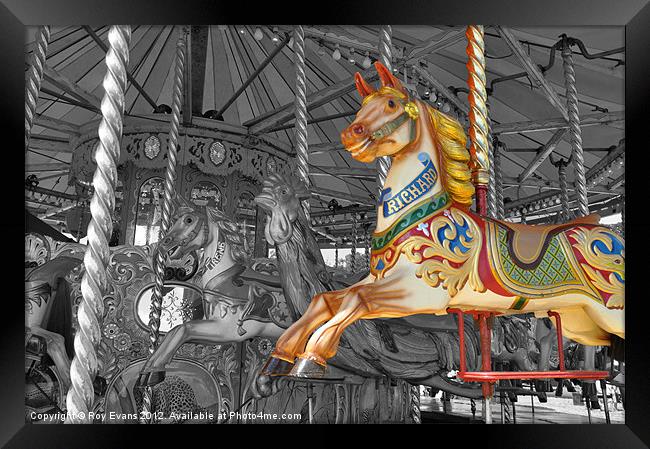Merry go round Framed Print by Roy Evans