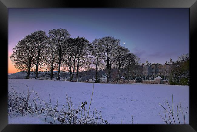 Enigmatic Plas Teg in Winter's Embrace Framed Print by Graham Parry