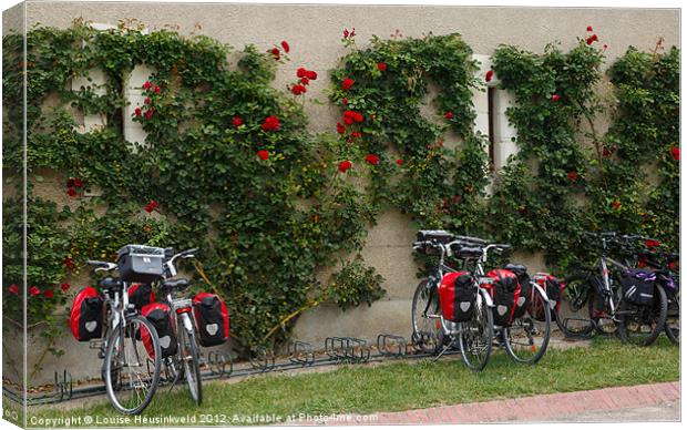 Bicycles Parked by the Wall Canvas Print by Louise Heusinkveld