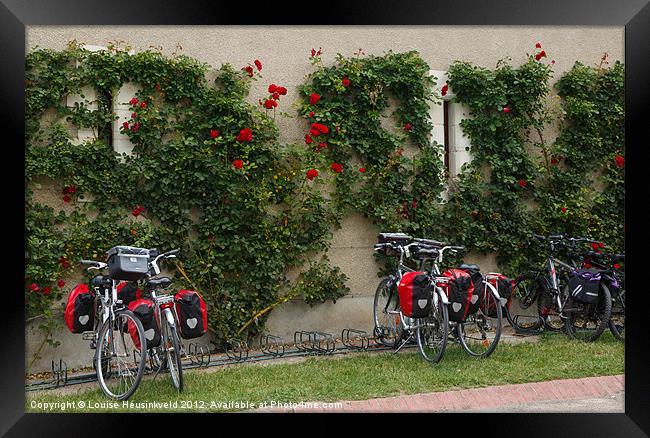 Bicycles Parked by the Wall Framed Print by Louise Heusinkveld