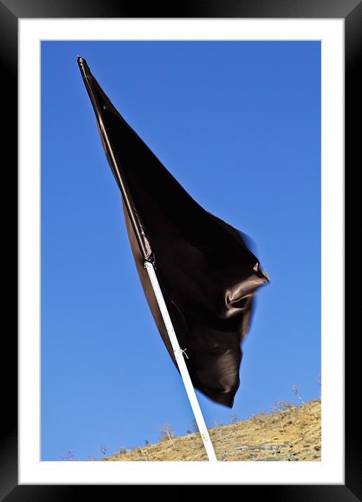 Black flag waving in a breeze Framed Mounted Print by Arfabita  