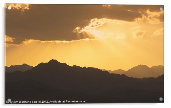 Sunlight through clouds at sunset over the Sinai d Acrylic by stefano baldini