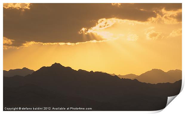 Sunlight through clouds at sunset over the Sinai d Print by stefano baldini