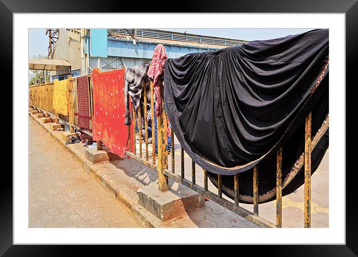 clothes drying on railway station railings Framed Mounted Print by Arfabita  