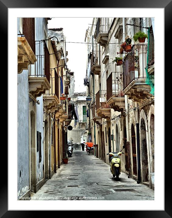 moped alley, Sicily Framed Mounted Print by Lucy Antony