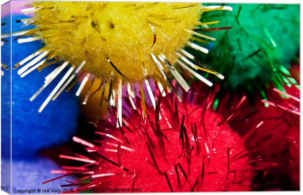 Tinsel coloured pompoms. Canvas Print by Lee Daly