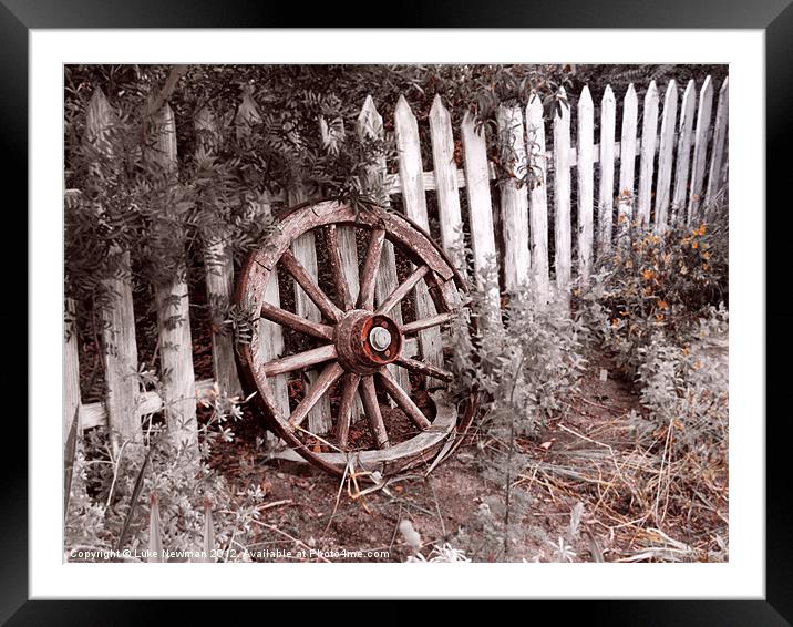 Picket Fence Cart wheel Framed Mounted Print by Luke Newman