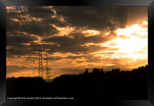 Sunset Pylon Framed Print by holly lyndon