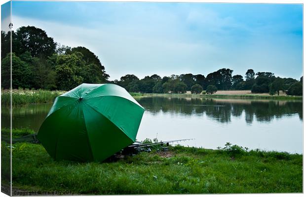 parasol fisherman Canvas Print by Lee Daly