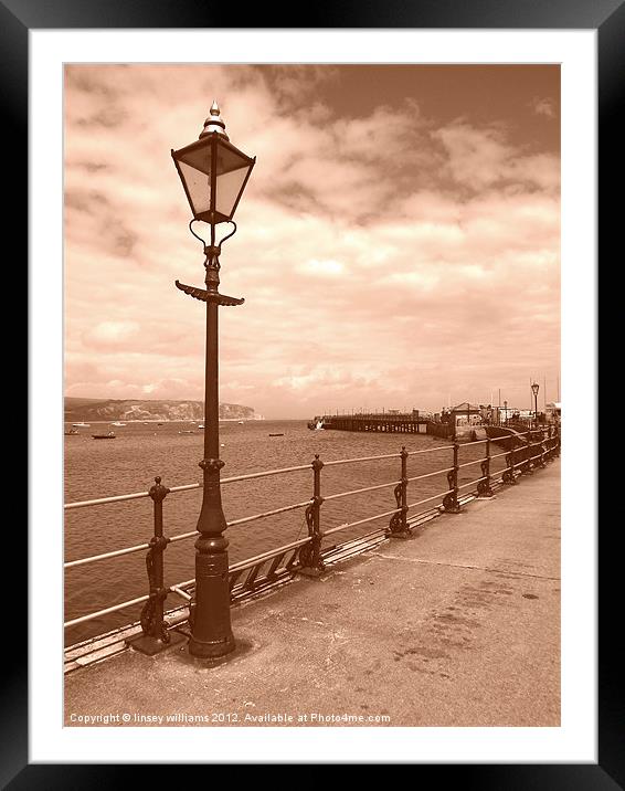 Sea front lamp Framed Mounted Print by Linsey Williams