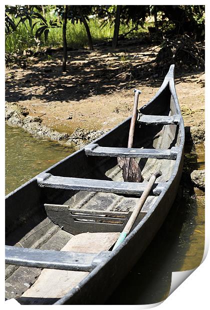 Angled canoe on sandy bank Print by Arfabita  