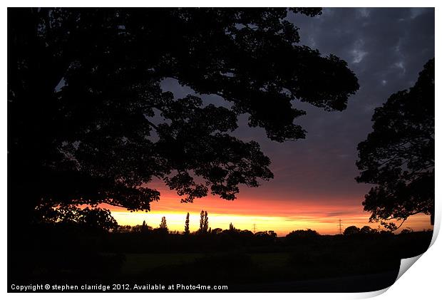 Sunset with tree silhouette Print by stephen clarridge