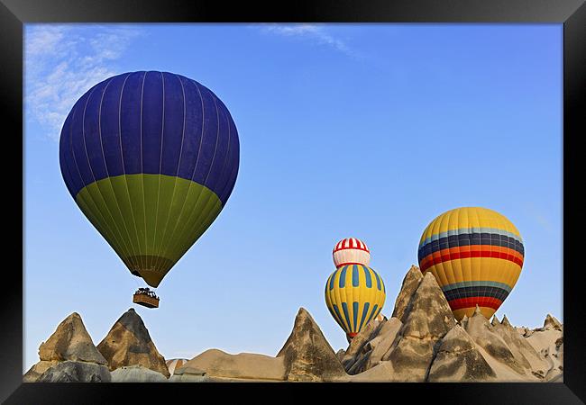 Hot balloons over Cappadocia Terrain Framed Print by Arfabita  