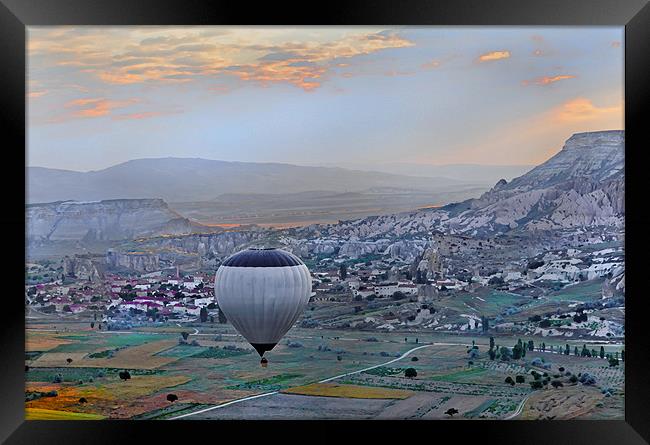 Lonesome Balloon over Cappadocia Framed Print by Arfabita  