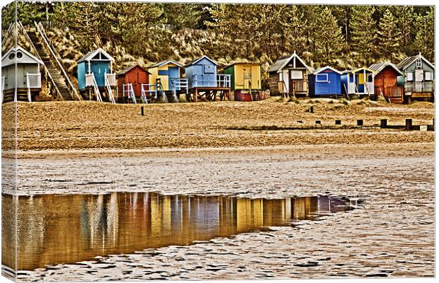 Colourful Wells Beach Huts Canvas Print by Paul Macro