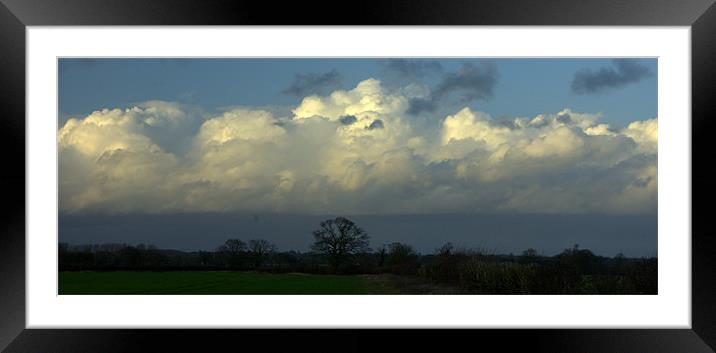 Clouds in the sky Framed Mounted Print by John Boekee