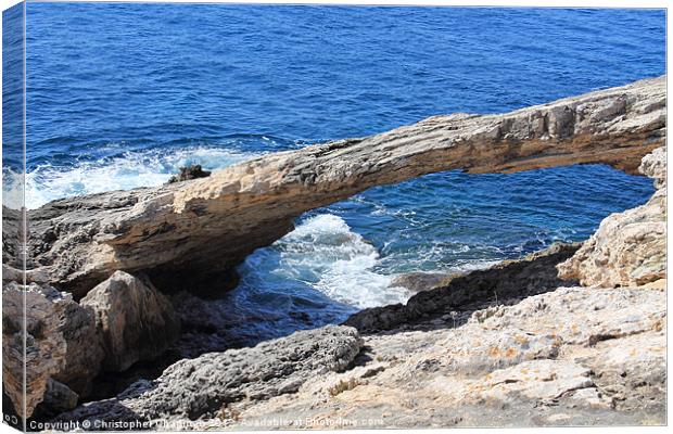 Rock Arch in the Med Canvas Print by Christopher Chapman