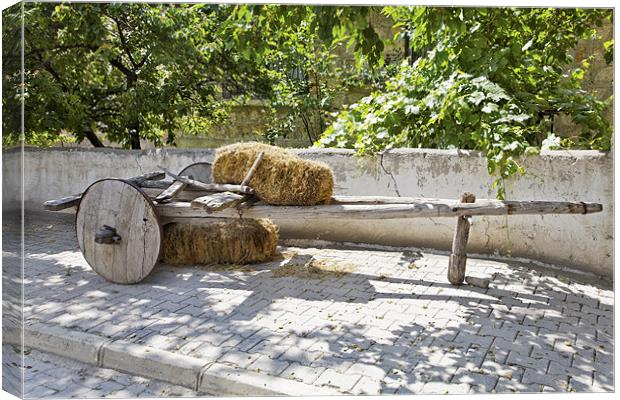 Old wooden Cart and Bales of Hay Canvas Print by Arfabita  
