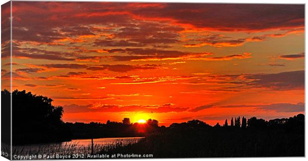 Sun setting Over Oulton Marsh Canvas Print by Paul Boyce