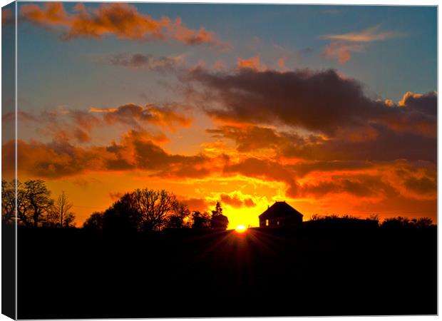 Sunset silhouette Canvas Print by Kevin White
