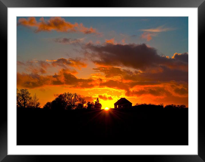Sunset silhouette Framed Mounted Print by Kevin White