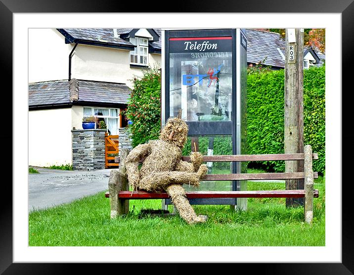 Strawman at Llanwrin Village Framed Mounted Print by philip clarke