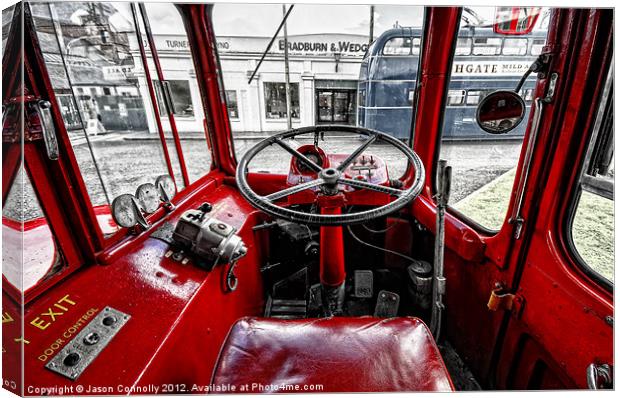 Big Red Bus Driving Cab Canvas Print by Jason Connolly