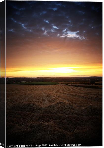 Sunset over fields Canvas Print by stephen clarridge