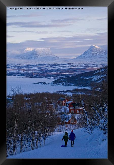 Couple walking in Lapland Framed Print by Kathleen Smith (kbhsphoto)