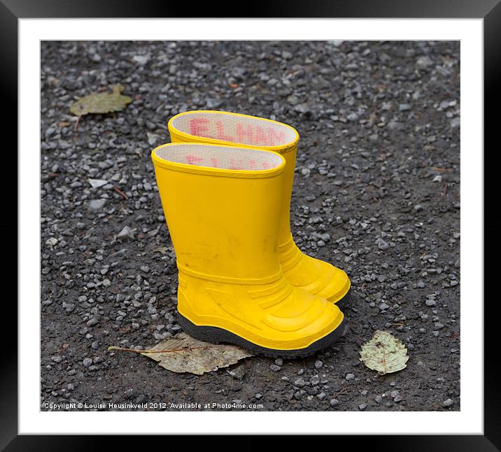 Yellow wellies Framed Mounted Print by Louise Heusinkveld